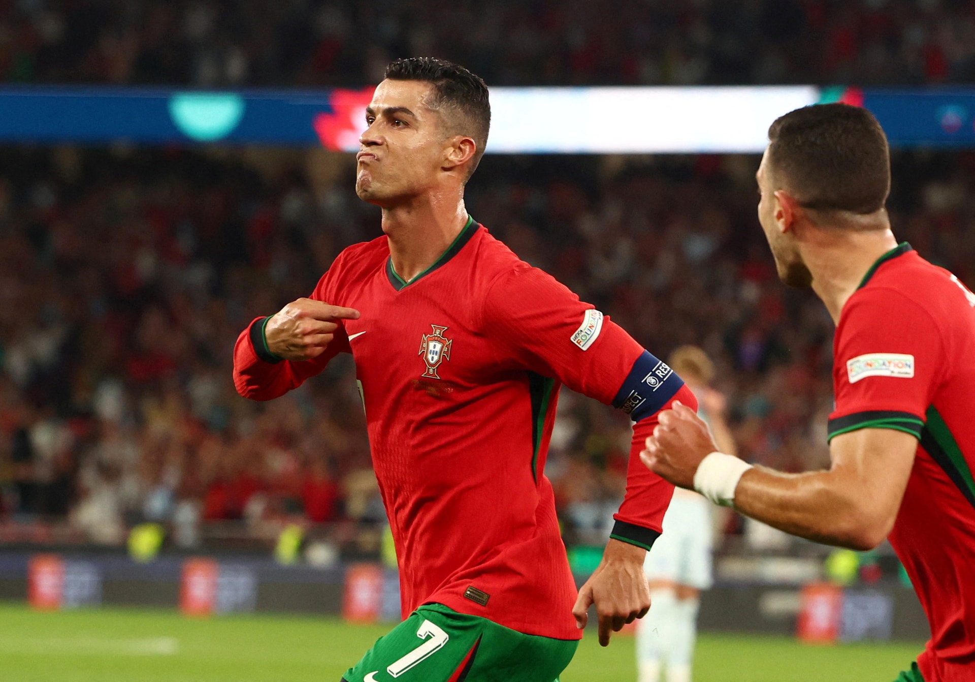 Ronaldo strikes late to give Portugal win over Scotland | Reuters