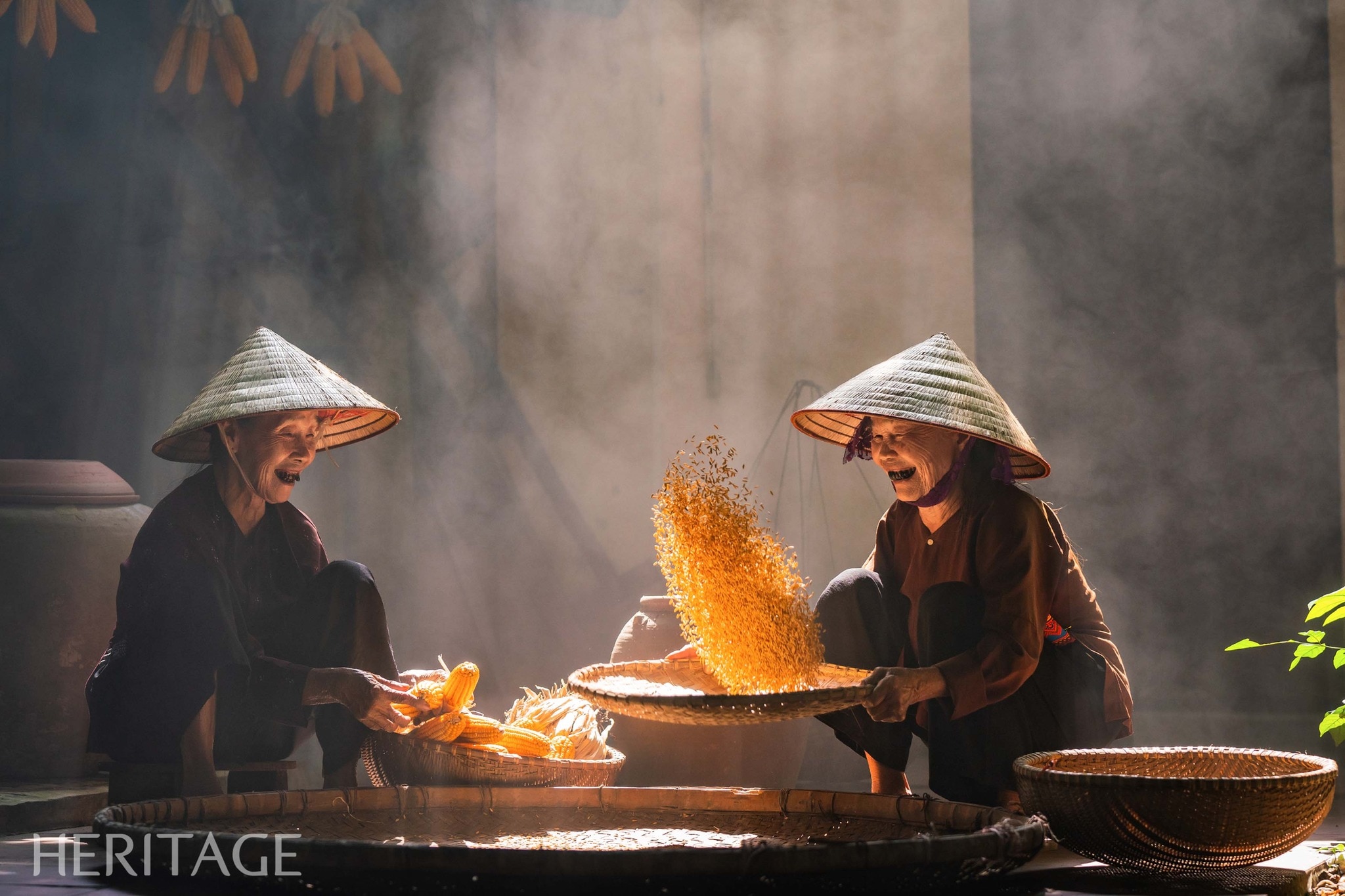 Có thể là hình ảnh về 2 người, ngọn lửa và văn bản cho biết 'HERITAGE'