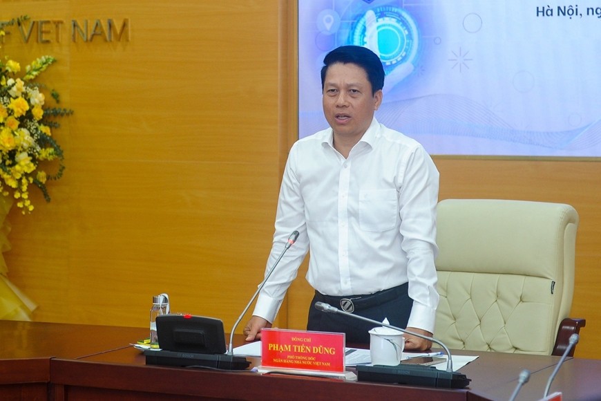  Phó thống đốc Ngân hàng Nhà nước Việt Nam Phạm Tiến Dũng phát biểu. Ảnh: THU PHƯƠNG