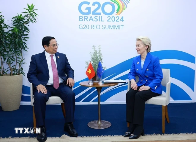 Thủ tướng Phạm Minh Chính gặp Chủ tịch Ủy ban châu Âu (EC) Ursula von der Leyen tại Hội nghị thượng đỉnh G20. (Ảnh: Dương Giang/TTXVN)