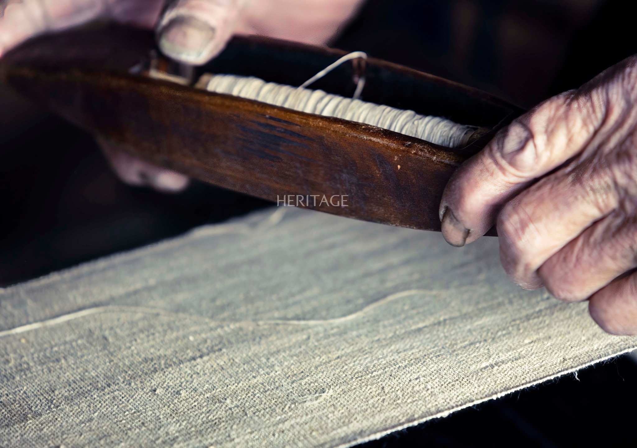 May be a close-up of saddle-stitched leather and indoor