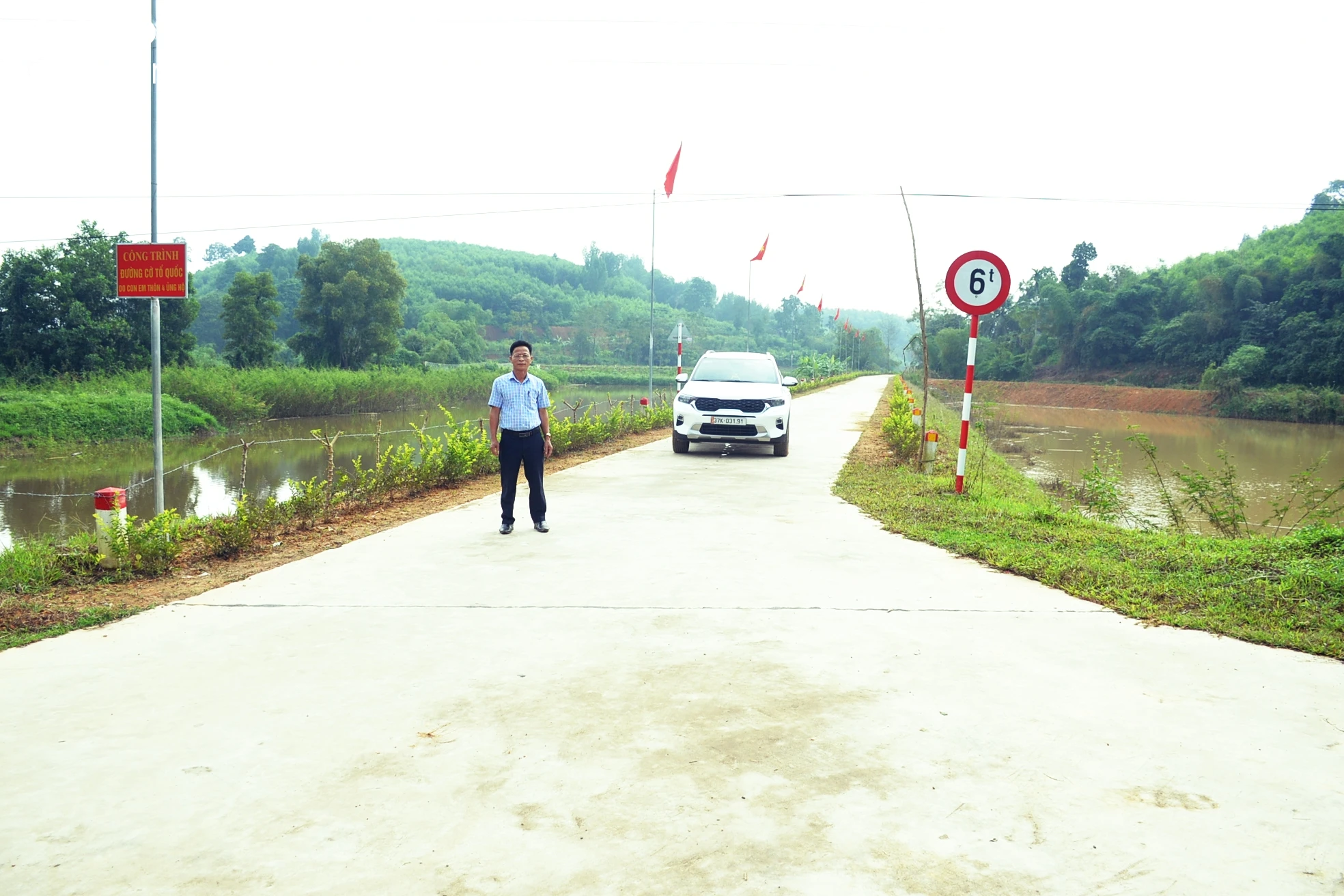 bna_Hệ thống giao thông chính của xã Cao Sơn, huyện Anh Sơn đã được bê tông hoá. Ảnh Xuân Hoàng.jpg