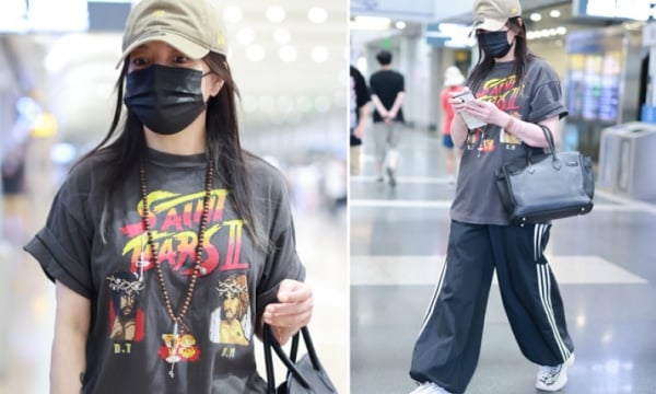 Zhao Wei attracts attention when appearing at the airport