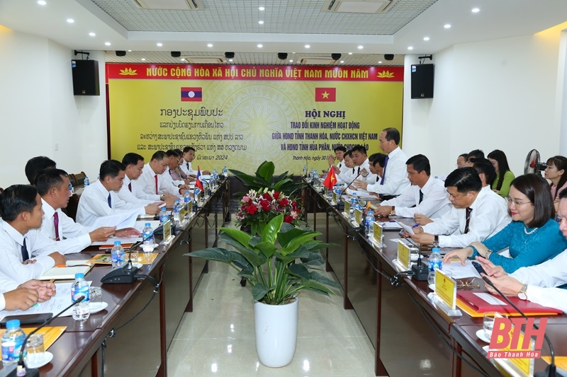 People's Councils of Thanh Hoa and Hua Phan provinces exchange operational experiences