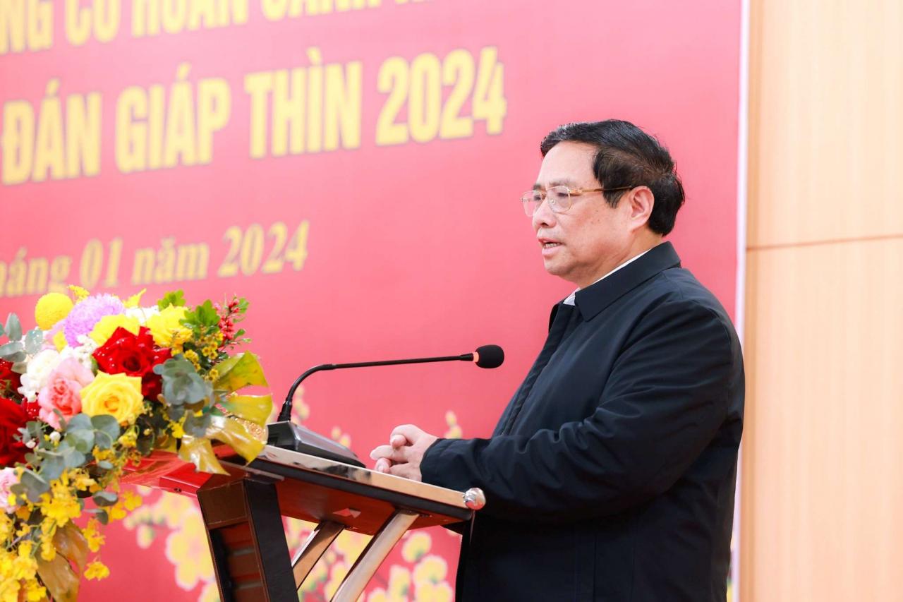Thủ tướng Phạm Minh Chính phát biểu tại buổi gặp gỡ, tặng quà công nhân lao động. Ảnh: Nguyễn Hải