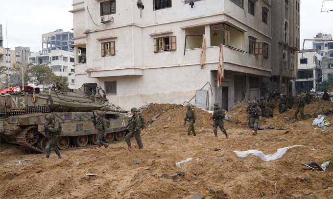 Xe tăng, binh sĩ Israel tham chiến tại Dải Gaza ngày 8/2. Ảnh: IDF
